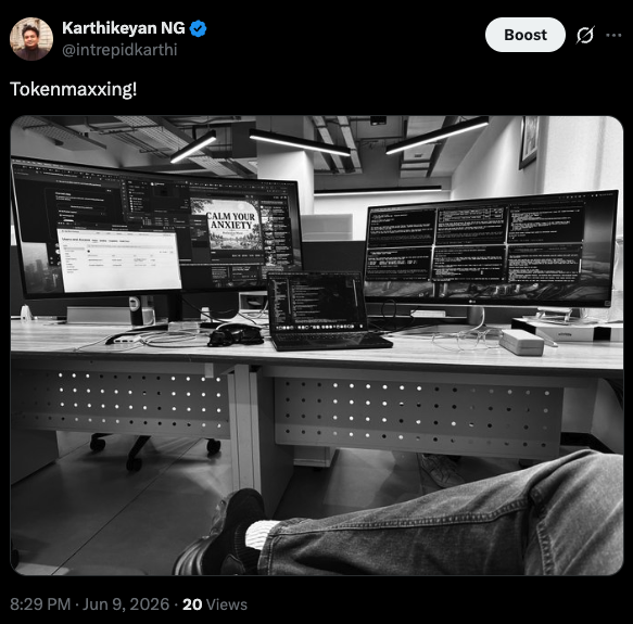 My desk in June 2026, posted as "tokenmaxxing"